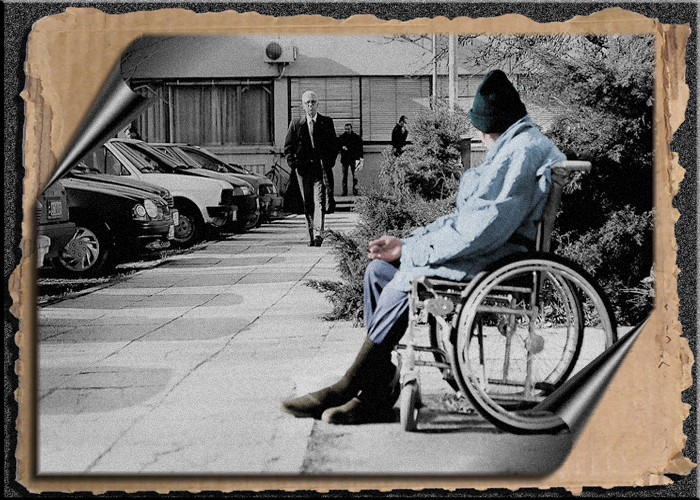 PERSON IN WHEEL CHAIR WAITING FOR ASSISTANCE